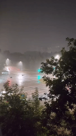 Stormy summer evening across Izhevsk streets and skylines