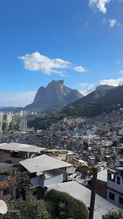 Aerial footage captures Rio favela panorama during evening hours
