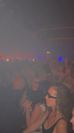 DJ performs at packed Barcelona nightclub early Saturday morning