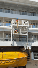 Ship maintenance crew works on cruise vessel platform Vancouver