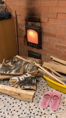 Active fireplace documented in Russian home