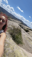 Tourist documents scenic mountain visit at Sini Vrah Bulgaria