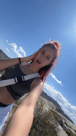 Tourist documents scenic mountain visit at Sini Vrah Bulgaria