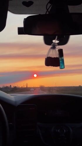 Driver travels with baby during sunset in Vyselki, Russia