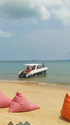 Beach scene captured in Baan Mae Nam, Thailand