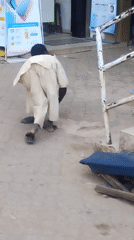 Street scenes captured in Jos show pedestrians and vendor