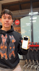 Young man shops for spreads and cookies in Sofia grocery store