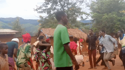Community celebration with dancing recorded in Ngalula, DRC