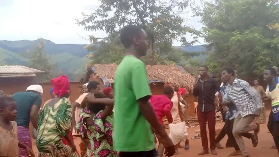 Community celebration with dancing recorded in Ngalula, DRC