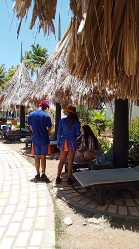 Resort guests enjoy amenities at Porlamar tropical hotel complex