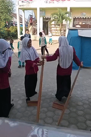 Traditional stilt play in a Keudekrueng courtyard