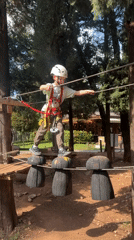 Children enjoy adventure ropes course activities in Podgorica park
