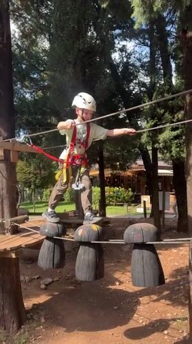 Children enjoy adventure ropes course activities in Podgorica park
