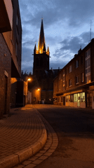 Evening stroll documented through illuminated Krefeld streets and architecture