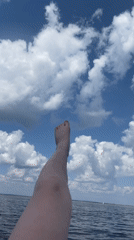 Relaxing on a paddleboard on open water in Chaikovsky
