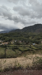 Overcast morning in Tà Rụt's hill village and river valley