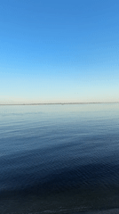 Calm waters filmed under clear skies near Soroch'i Gory