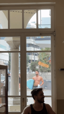 Tel Aviv cafe and street life on a summer morning