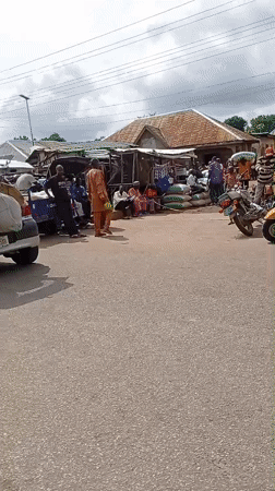 Word-card graphics and street scenes from Sunkani, Nigeria