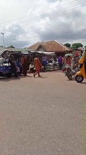 Word-card graphics and street scenes from Sunkani, Nigeria
