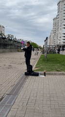 Street violinist performs for morning commuters in Saint Petersburg