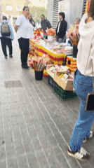 Book and flower vendor operates in Barcelona streets