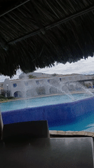 Resort pool area with fountains filmed in Juangriego