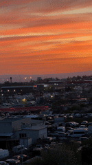 Dramatic sunset illuminates Varna cityscape, witnessed across Bulgaria