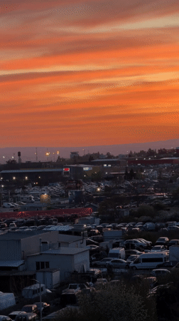 Dramatic sunset illuminates Varna cityscape, witnessed across Bulgaria