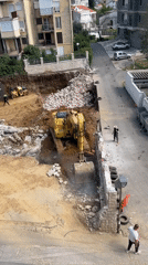Excavator conducts demolition work at Boreti construction site