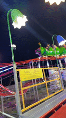 Summer fair night in Gatteo, rides and lights in full swing