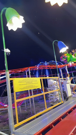 Summer fair night in Gatteo, rides and lights in full swing