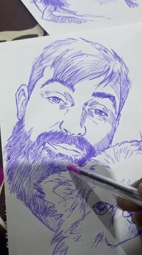 Live ballpoint portrait sketching session in Abuja, referencing a laptop photo