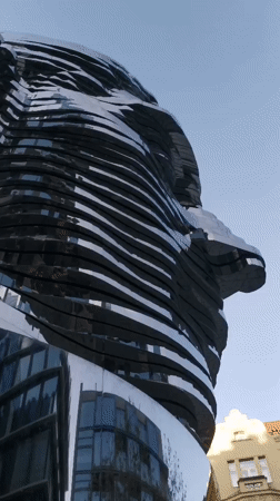 Prague's iconic layered metal head sculpture, up close