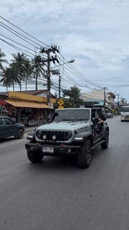 Jeep and fresh coconuts on a wet Ko Samui morning