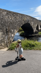 Scooter ride along a stone bridge path in Clonmel
