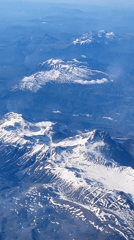 Aerial footage captures snow-capped peaks near Navelli, Italy