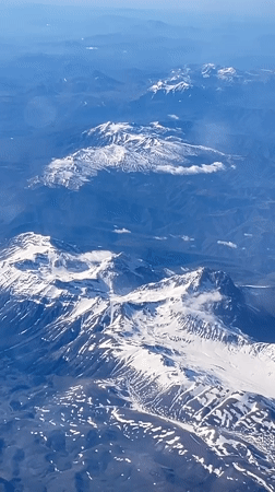 Aerial footage captures snow-capped peaks near Navelli, Italy