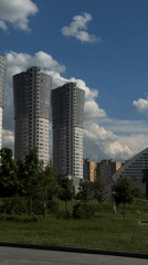 Person enjoys sunny afternoon in Moscow residential park area