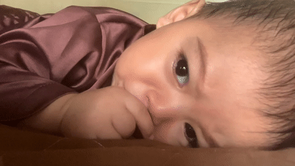 Family moments captured in Indonesian home with baby and child
