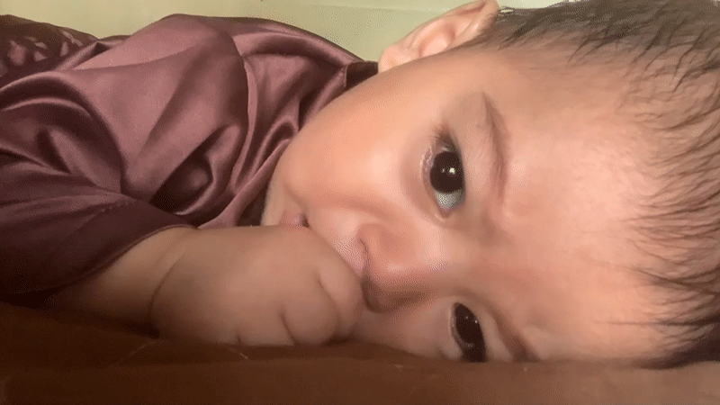 Family moments captured in Indonesian home with baby and child