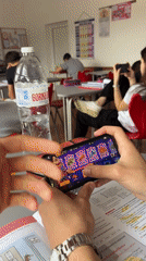 Students play mobile games, study during classroom session in Bulgaria