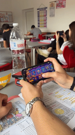 Students play mobile games, study during classroom session in Bulgaria