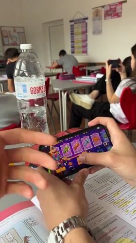 Students play mobile games, study during classroom session in Bulgaria