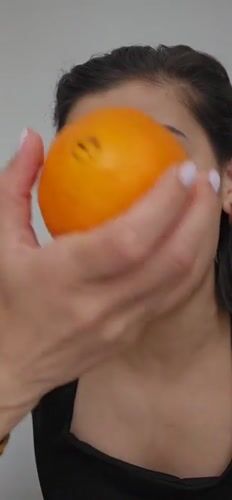 Ordinary moments captured in Tashkent: woman with orange, philosophical text