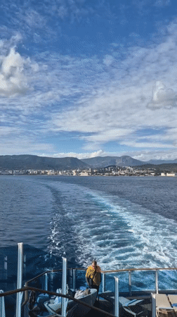 Cruise ship departs Ajaccio harbor with passengers aboard