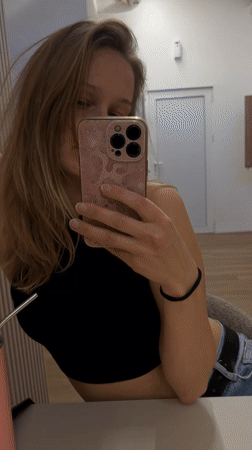 Woman takes mirror selfie in Budva, Montenegro