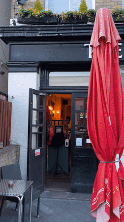 London pub entrance captured with no-smoking signage visible