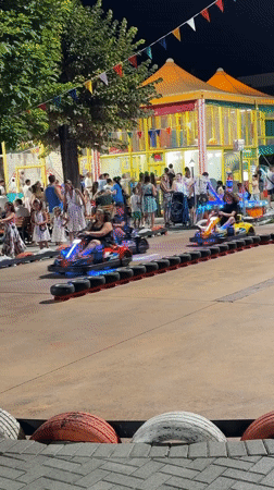 Evening at a Gatteo amusement complex: go-karts, arcade games, mini-golf