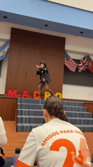 Steampunk performer entertains youth audience at Mexico gymnasium event